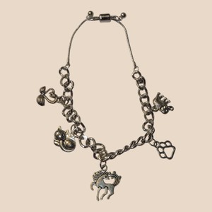 Gold-Tone Adjustable Animal Charm Bracelet  Horse, Elephant, Cat & Paw