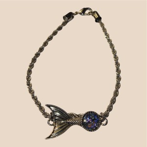 Gold-Tone Mermaid Tail Bracelet with Iridescent Blue-Purple Accent