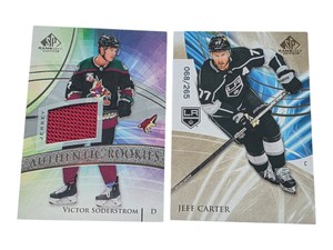 Lot of 2 Upper Deck SP Game Used Hockey Cards  Victor Soderstrom Jersey Rookie & Jeff Carter 265