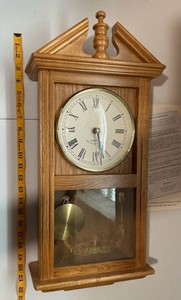 Vintage golden oak quartz wall clock, pediment top, swinging brass finish pendulum, Westminster chimes