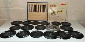Vintage music lot- Approx. 15, 45 RPM vinyl records, Tchaikovsky LP & Revolution book set, Time Life Demonstration Soundsheets