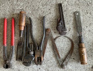 Vintage lot of hand tools, pipe wrenches, wood chisels, pliers & caliper