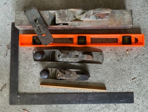 Various tools, antique planes, square and more