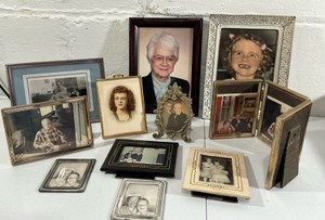 Large group vintage metal, Tin, Faux leather old frames with photos desk
