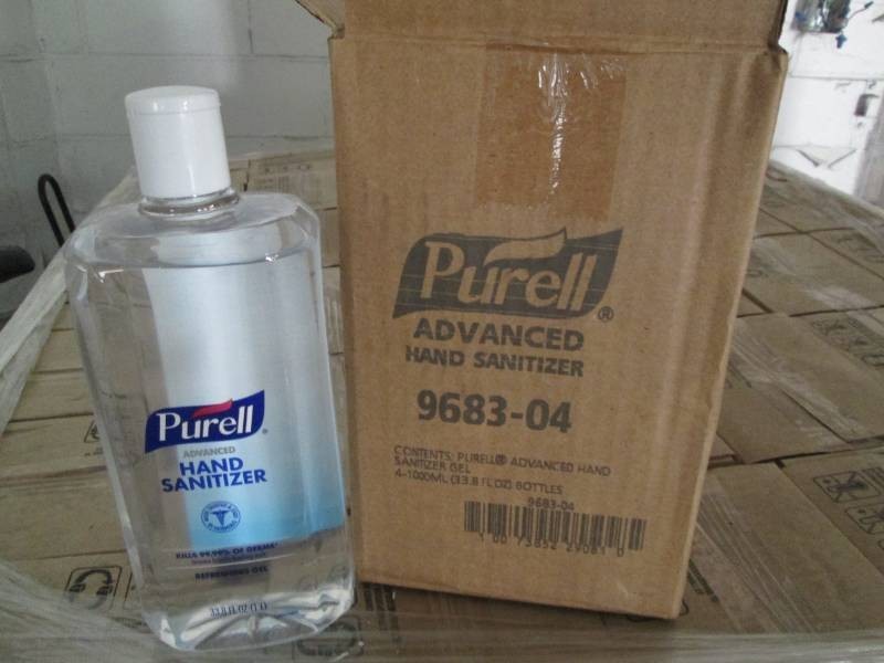 4 33.8 Oz Purell hand sanitizer gel bottles