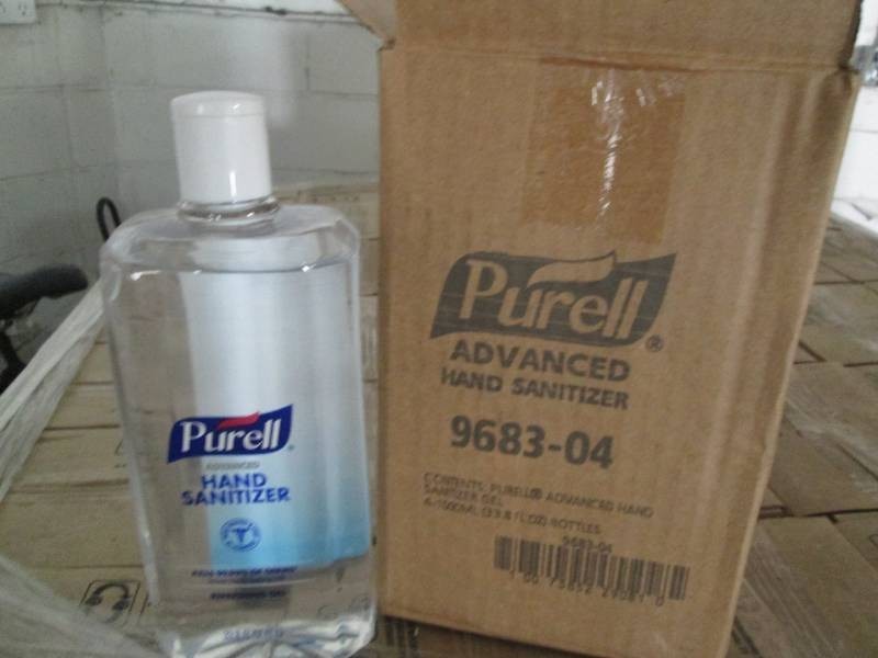 4 33.8 Oz Purell hand sanitizer gel bottles
