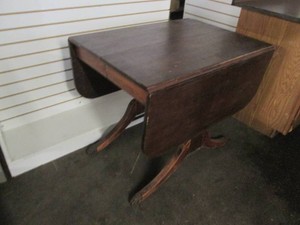 Antique drop leaf table with metal claw feet