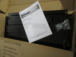 Husky black metal 52 -72 adjustable pegboard