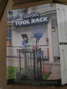Metal garden tool rack with hooks