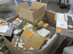 Pallet of assorted tile, carpet squares and flooring products