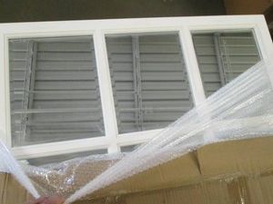 White multi panel beveled edge wall mirror 26 x 35 inches