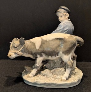 DR - Porcelain Figurine - Royal Copenhagen Farmer & Cow Model 779