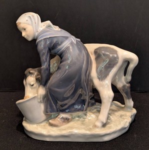 SR - Royal Copenhagen Porcelain Figurine Girl Feeding a Calf (Model #779)