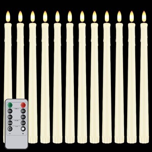 $22 12 Pcs Flickering Flameless LED Taper Candles, 11 Long Fake Taper Candles Battery Operated with Remote Timer, Ivory Plastic Electric Dripping Candlesticks for Wedding Party Holiday