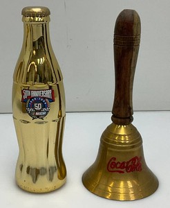 Collectible Vintage Coca-Cola Items Including Brass Bell And 50th Anniversary NASCAR Gold Coca-Cola Bottle