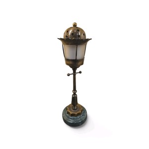 vintage miniature streetlamp-style table lighter or decorative accent piece featuring a brass lantern fixture on a green marble base