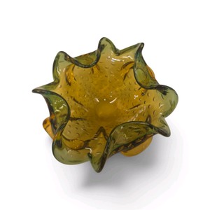 vintage mid-century Murano art glass bowl or ashtray featuring a free-form ruffled edge, amber-to-green coloration, and a distinctive bullicante. it measures 7 squared  4 tall