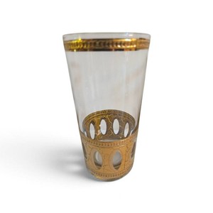 Valued at $175 set of vintage mid-century modern Culver Antigua highball glasses featuring a textured 22-karat gold overlay and raised oval window panels