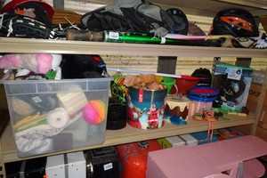 Contents of Shelf - Assorted Sporting Goods, Toys, Shoes