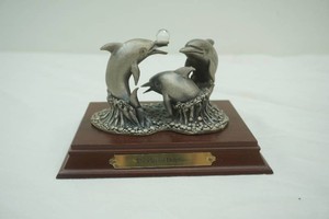 The Playful Dolphins pewter Figurine with wood base and crystal ball accent