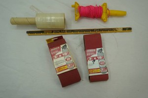 3x 18 sandpaper, plastic wrap, twine, blades