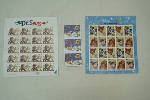 Collectible Stamps 37 Cent The Art of Disney Friendship circa 2004 Dr. Seuss 37 Cent Stamps 2003 Santa and Sleigh Forever Stamp Book circa 2012
