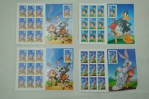 Collectible Looney Tunes Commemorative Postage Stamp Sheets 1996, 1999, 2000.