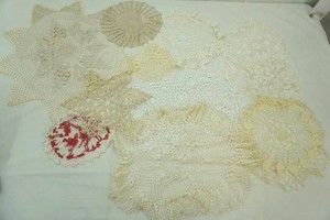 large group of vintage doilies