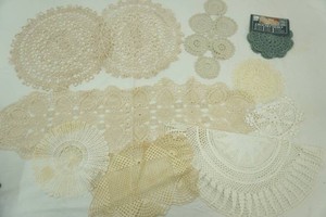 large group of vintage doilies