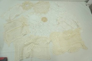 large group of vintage doilies