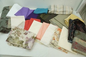 large assortment of fabric in a variety of styles and sizes