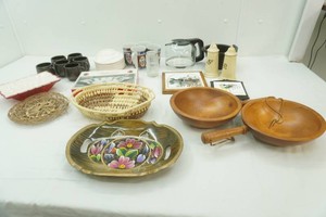 kitchen ware including dishes, coffee pot, woven baskets, wood bowls and more