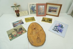 variety of wall decor including wood carving, gold foil prints and more