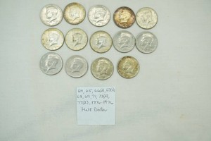 14 US Half Dollar coins from 1964 to 1977 including one Bicentennial