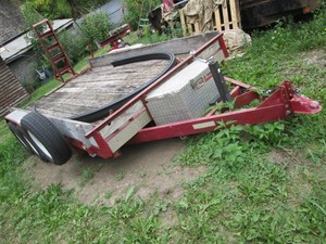 2001 14ft dual axle MRK trailercar hauler with 2-516 hitch, new brakes, tires and bearings, an Owens Pro mounted gearbox with a variety of chains and tow related accessories