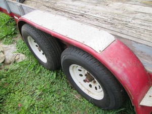 2001 14ft dual axle MRK trailer/car hauler with 2-5/16 hitch, new brakes, tires and bearings, an Owen's Pro mounted gearbox with a variety of chains and tow related accessories