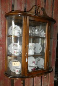 Curio cabinet with contents