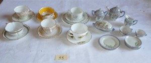 6 Cups and Saucers and a Vintage Mini tea set