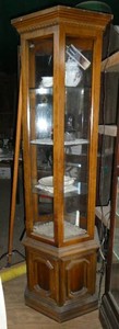 Hexagon shaped curio cabinet