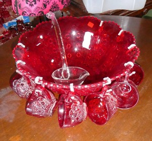 Red glass punch bowl with 9 cups