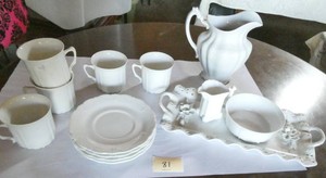 Pitcher, cups and saucers and serving platter