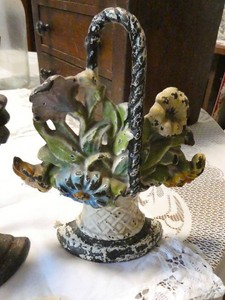Two Antique cast iron door stops