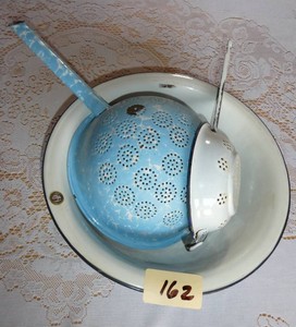 2 enamelware strainers and bowl