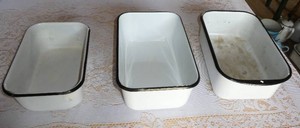 THREE enamelware baking pans