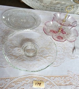 Two Cake plates and a tiered serving dish