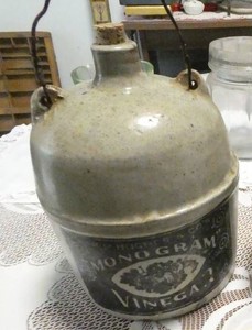 Antique pottery Hughes Monogram Vinegar jug