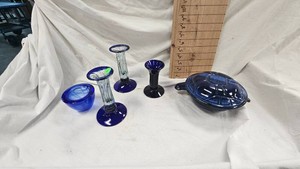 Candle Sticks and Blue Glassware