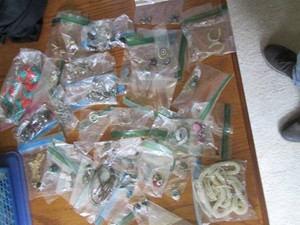 Assortment of costume jewelry including necklaces and earrings with various metals, Beads, stones and other costume jewelry pieces with the possibility of precious metals