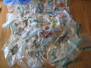 Lots of Beaded necklaces and earrings and other costume jewelry with the possibility of precious metals
