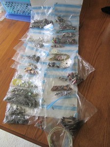 Costume jewelry in varying styles and materials with the possibility of precious metals